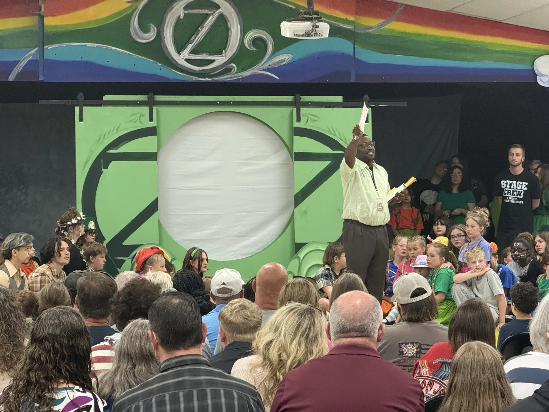 Jason Wright addressing a packed audience at Wizard of Oz production