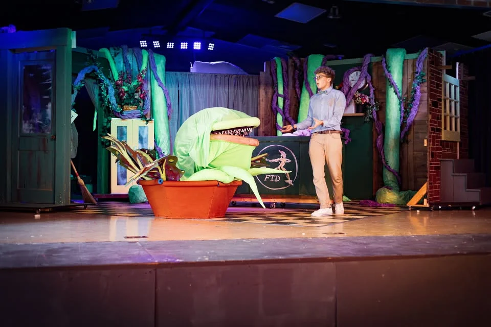 Little Shop of Horrors — Seymour on stage, Piedmont City Schools Theater